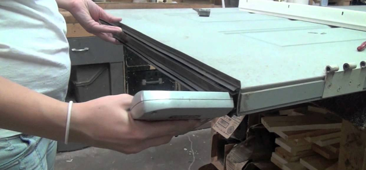 damaged steel door repair Southwest Edmonton